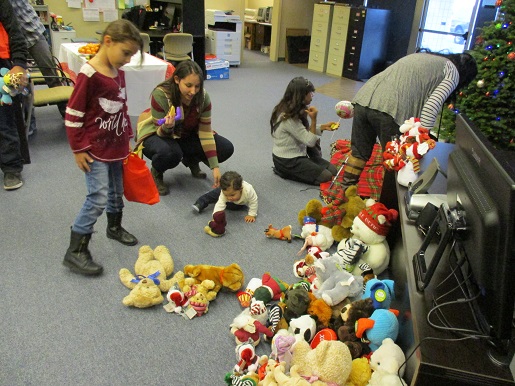 Families are getting stuffed animals and listening to stories
